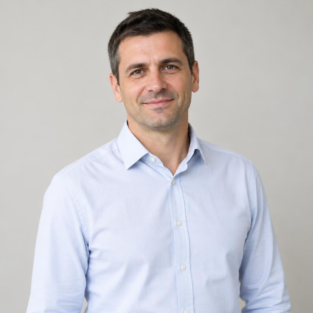 Portrait of a man in a shirt with a friendly expression